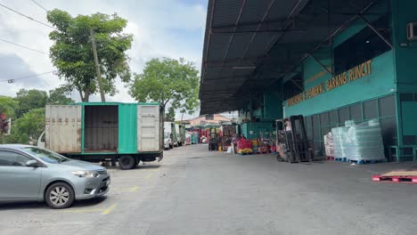 Panning-view-of-an-industrial-grocery-warehouse-near-Taman-Molek,-Johor-Bahru,-Malaysia
