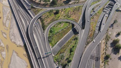 Aerial-View-Of-Highway-Roads-Beside-Bicentenario-Park-In-Santiago,-Chile