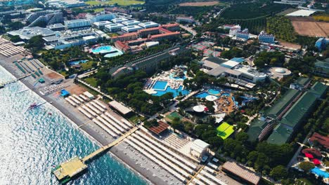 Aerial-4K-drone-footage-of-Kiriş--Kemer-,-and-mountains-–-filmed-in-a-vibrant-summer-time
