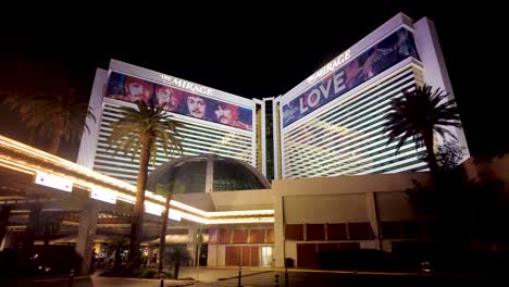 Capturing-the-spirit-of-Las-Vegas,-this-video-showcases-The-Mirage's-dazzling-lights-and-the-renowned-Beatles'-Love-by-Cirque-du-Soleil-advertisement