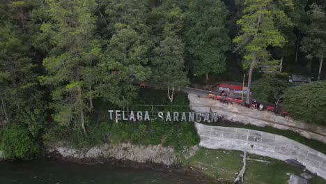 Aerial-view-of-the-Sarangan-Lake-tourist-destination-"Sarangan-Lake"-in-Magetan,-East-Java,-Indonesia