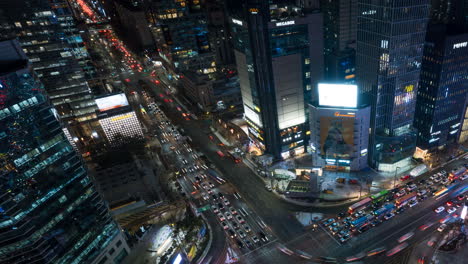 Hyperlapse-of-Busy-Night-Cars-Traffic-at-Gangnam-Station-Crossroad-in-Winter-Seoul---Aerial