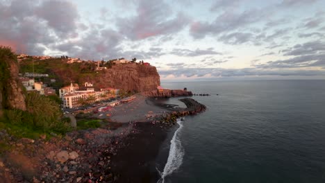 Sunset-light-over-a-rocky-shore-in-the-small-town-of-Ponta-do-Sol-Madeira