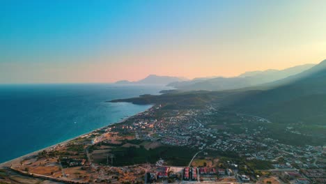 Aerial-4K-drone-footage-of-Kiriş-
Kemer-,-and-mountains-–-a-captivating-sunset-captured-in-vibrant-summer