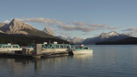 Maligne-lake-tour-boats-docked-at-floating-jetty-during-off-season