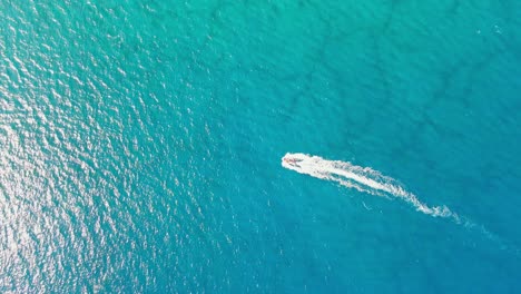 Aerial-4K-drone-ultra-wide-top-down-video-of-luxury-speed-boat-cruising-in-high-speed-in-Mediterranean-sea