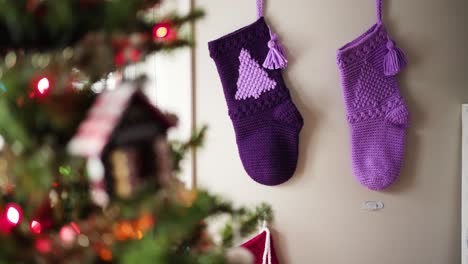 Cinematic-Rack-Focus-from-Crochet-Stockings-to-Christmas-Tree-Ornament