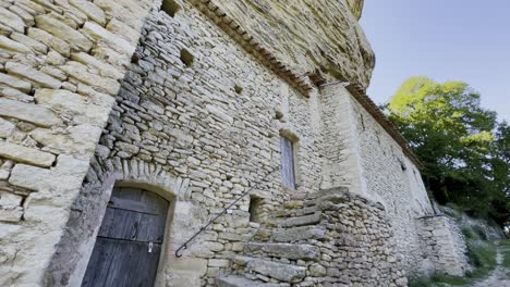 old-small-stone-house-on-a-large-rock-in-the-sun-garade-storage-location-from-the-past-history