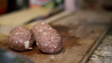 Preparing-beyond-vegan-meatballs-Preparing-ingredients-to-make-vegan-beyond-meatballs-with-spaghetti-and-meat-sauce
