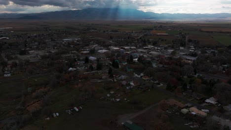 Drone-aerial-view-of-Malad-City,-Idaho-after-a-storm-passed-through