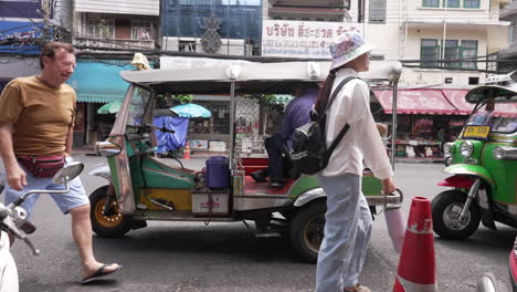 Tuktuk-Parked-on-Street-in-Chinatown-in-Bangkok,-Thailand