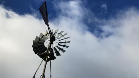 Closeup-of-windmill,-blue-sky-background