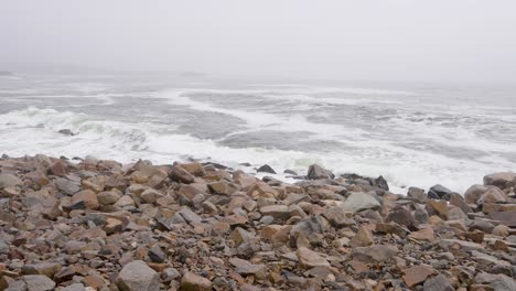 Waves-crushing-on-rocks-on-a-foggy-day