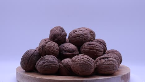 Walnuts-rotating-on-a-turntable.-Turning-walnuts