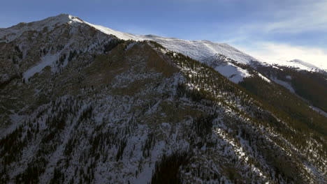 Peaks-of-i70-Silverthorne-Leadville-Frisco-ten-mile-range-aerial-drone-cinematic-Copper-Mountain-base-Colorado-Winter-December-Christmas-landscape-forward-circle-left