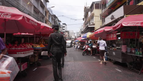 Police-Officers-Inspecting-Street-Food-Stalls-in-Chinatown-in-Bangkok,-Thailand