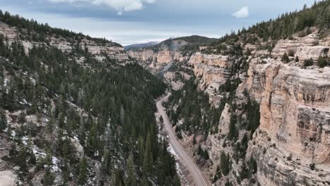Steep-Rock-Walls-Through-State-Highway-14-Through-Cedar-Canyon,-Utah,-USA