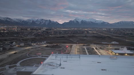 Pullback-aerial-reveal-of-the-Primary-Children's-Hospital-in-Lehi,-Utah-at-dawn