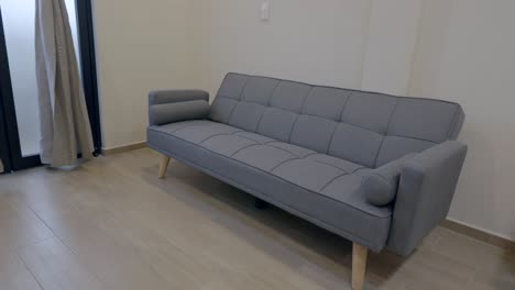 Simple-Gray-Couch-Inside-The-Hotel-Room