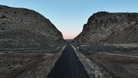 Desolate-Road-Towards-The-Parowan-Gap-Petroglyphs-Near-Cedar-City-In-Utah,-USA