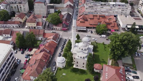 Aerial-orbiting-shot-of-Ferhadija-Mosque,-Famous-mosque-in-Banja-Luka-City,-Bosnia-and-Herzegovina