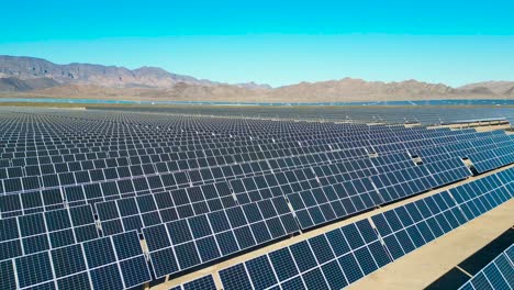 An-aerial-shot-showing-an-vast-solar-farm-outside-of-the-major-city-of-Las-Vegas,-Nevada