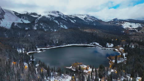 Upper-lower-Lost-Lake-Kebler-Pass-aerial-cinematic-drone-Crested-Butte-Gunnison-Colorado-seasons-collide-early-fall-aspen-tree-red-yellow-orange-forest-winter-first-snow-powder-Rocky-Mountains-forward