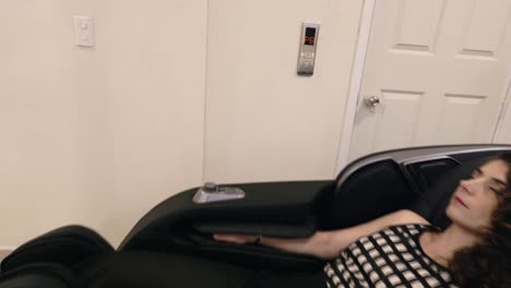 Girl-Lying-And-Sleeping-On-Massage-Chair