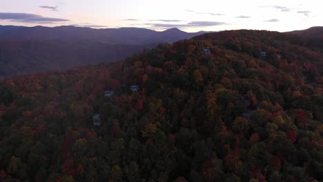 Cinematic-Aerial-of-the-Smoky-Mountains-and-cabins-in-Fall-Colors,-Pigeon-Forge,-TN