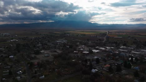 Drone-flyover-of-Malad-City,-Idaho-after-a-storm-came-through
