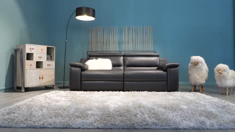 Static-shot-of-a-modern-basic-living-room-setup-in-a-furniture-store