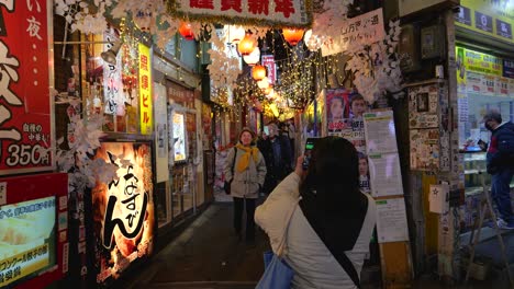 Famous-Piss-Alley-aka-Omoide-Yokocho-in-Tokyo,-Japan-in-bright-neon-lights