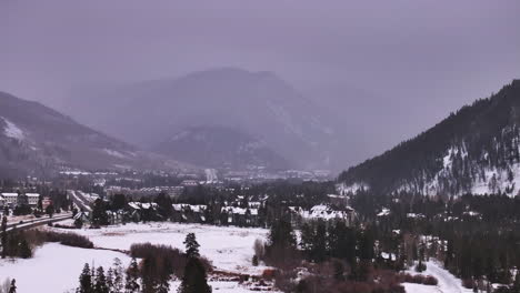 Cinematic-Colorado-aerial-drone-winter-December-Christmas-Summit-Cove-Keystone-Ski-Resort-Epic-Local-Pass-entrance-Rocky-Mountains-i70-Breckenridge-Vail-Summit-County-High-Country-living-upward-motion