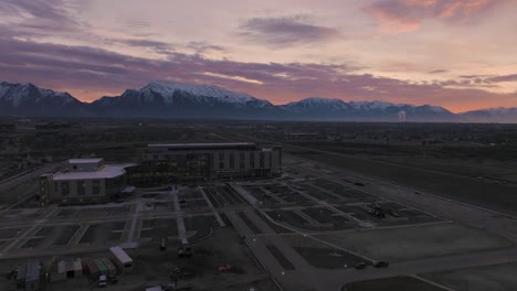 Primary-Children's-Hospital-in-Lehi,-Utah---pullback-aerial-view-at-sunrise