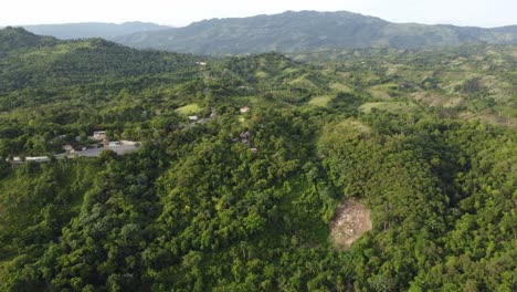Aerial-view-of-the-green-landscape-around-Tubagua-in-the-northern-mountain-range-near-Puerto-Plata-in-the-Dominican-Republic