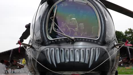 Close-up-of-Mil-Mi-24-attack-helicopter-cockpit-and-front-barrel-minigun