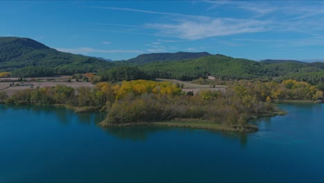 Aerial-view-of-empty-land-at-Lake-Banyoles-in-autumn