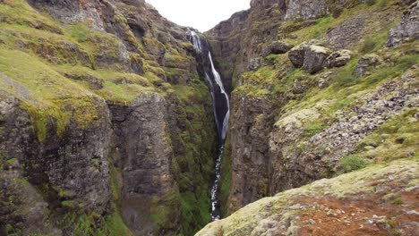 View-of-the-Glymur-waterfall-on-the-Botsná-river-from-the-Hvalvatn-lake-near-the-Hvalfjörður-fjord---Iceland