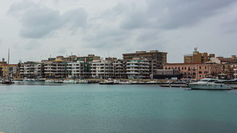 Marina-and:-Villas-Dance-Beneath-Rolling-Clouds