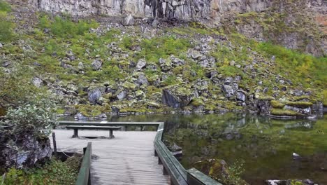 POV-hiking-trail-to-the-Botnstjörn-pond-in-the-Ásbyrgi-Canyon---Jokulsargljufur-National-Park,-Iceland