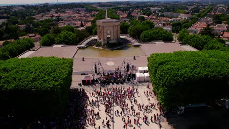 Peyrou-Gardens-in-Montpellier,-France,-during-Gay-Pride,-aerial-view