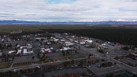 Drone-aerial-view-of-West-Yellowstone-and-all-the-forest-that-surrounds