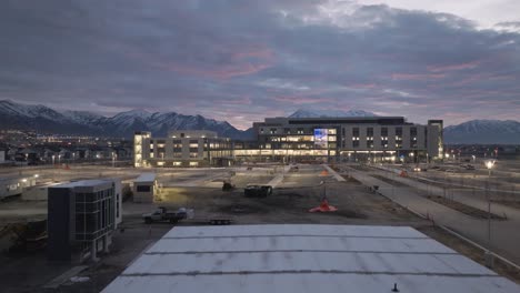 Primary-Children's-Hospital-in-Lehi,-Utah---descending-aerial-view-at-sunrise
