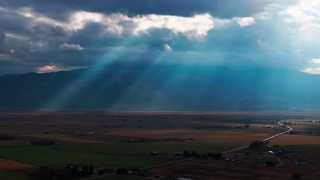 Telephoto-drone-shot-of-sunlight-rays-coming-through-the-clouds