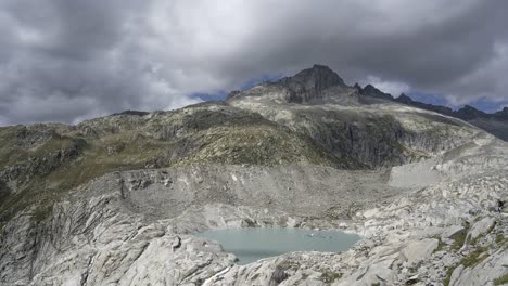 Scenic-View-Of-A-Swiss-Glacier-And-Its-Glacial-Lake-In-The-Alps