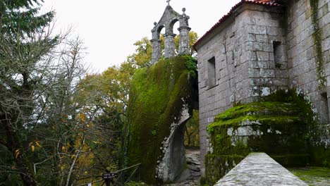 Mossy-Rupestre-church-bell-tower,-Esgos,-Spain