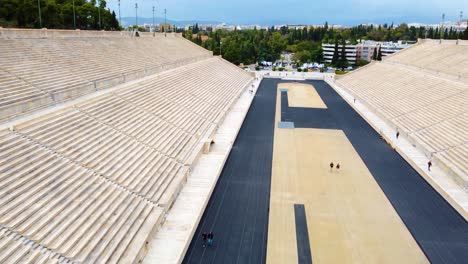 U-shaped-Track-Of-Panathenaic-Stadium-With-Tourists-In-Athens,-Greece