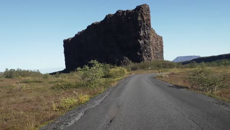 POV-driving-car-through-the-Asbyrgi-Canyon-in-Jokulsargljufur-National-Park,-Iceland