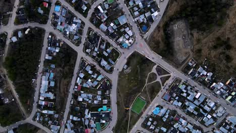 Top-down-drone-shot-flying-over-Ushuaia,-Argentina