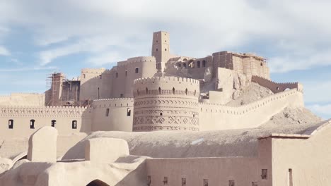 Restored-Arg-e-Bam-Citadel,-Kerman,-Iran-under-blue-skies